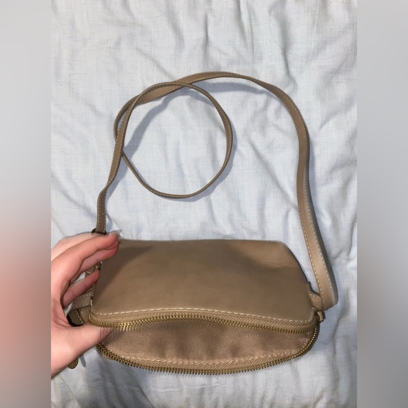 Small tan colored crossbody purse. - Picture 3 of 4